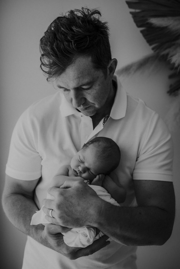 just born photographed with his father